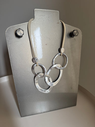 Eliza Gracious Silver Multi Ring on Cream Leather Necklace