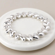 Load image into Gallery viewer, POM Silver Plated Worn Hearts Stretch Bracelet
