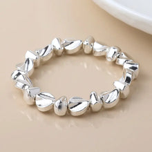 Load image into Gallery viewer, POM Silver Plated Organic Bead Stretch Bracelet
