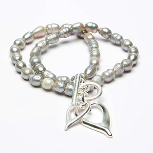 Eliza Gracious Seed Shaped Freshwater Pearl Bracelet with Twin Hearts